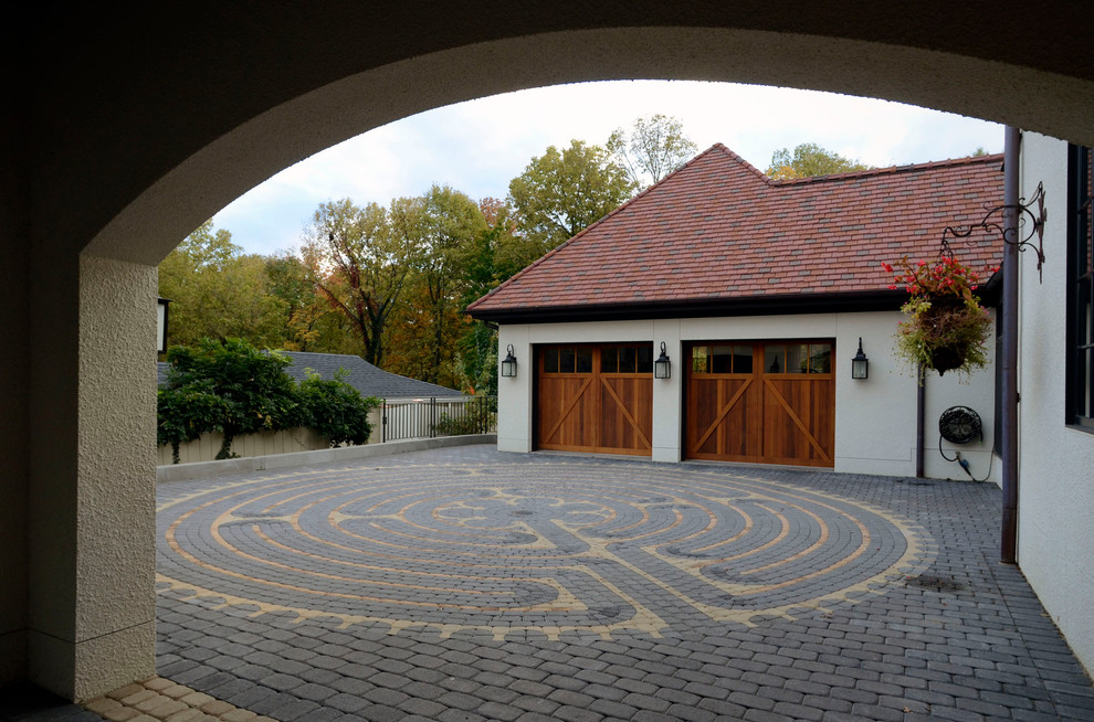 Elegant two-car garage photo in Cincinnati