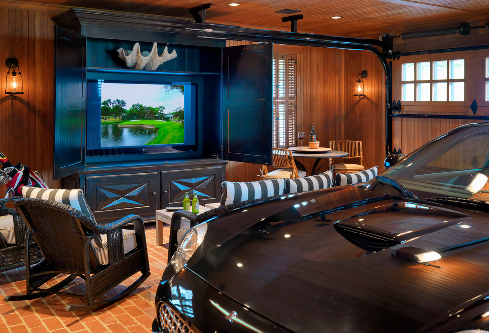 Example of a beach style one-car garage design in Boston