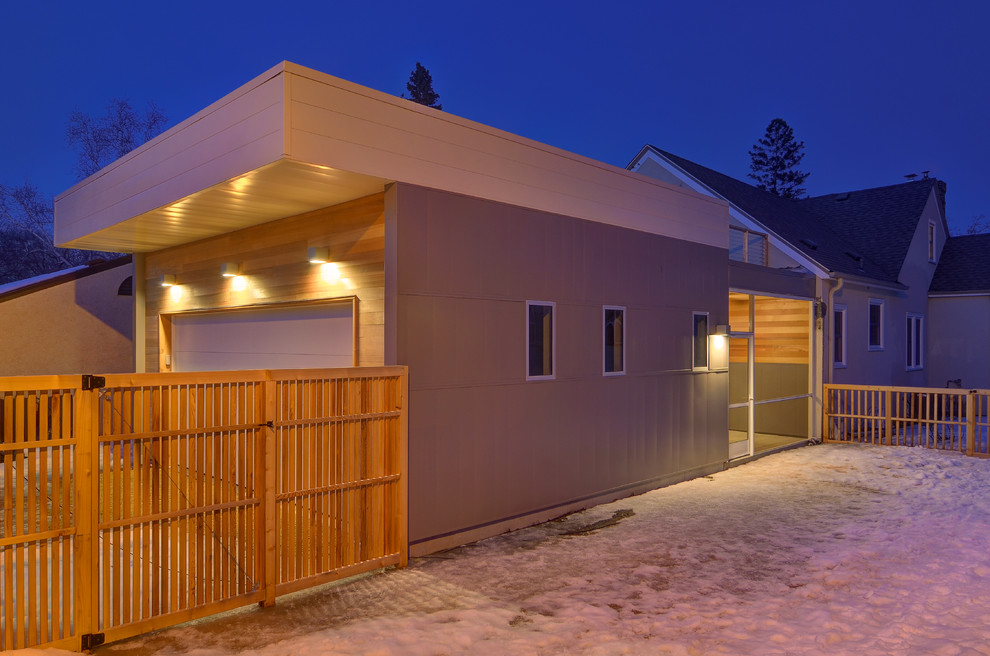 Example of a trendy attached garage design in Minneapolis