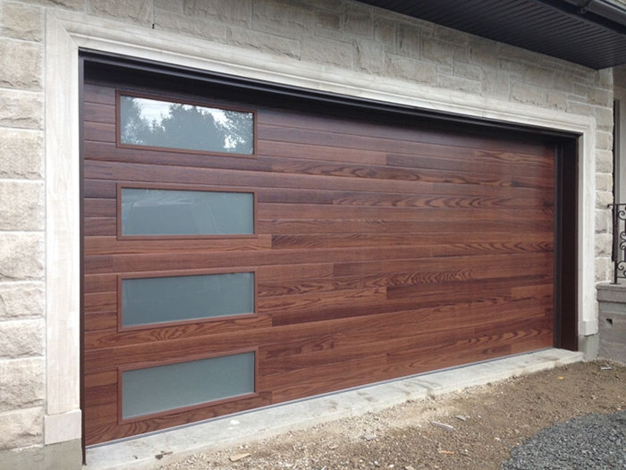 Inspiration for a large contemporary attached double garage in Cleveland.