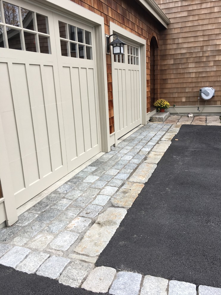 Photo of a medium sized beach style attached double garage in Boston.