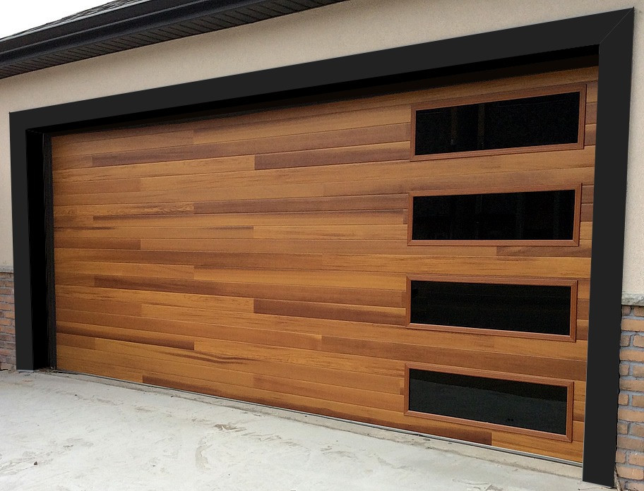Inspiration for a medium sized modern double garage in Toronto.