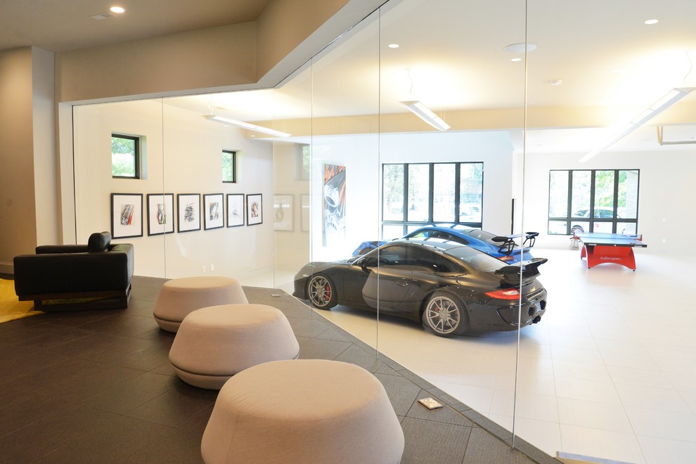 Large contemporary attached garage in St Louis with four or more cars.
