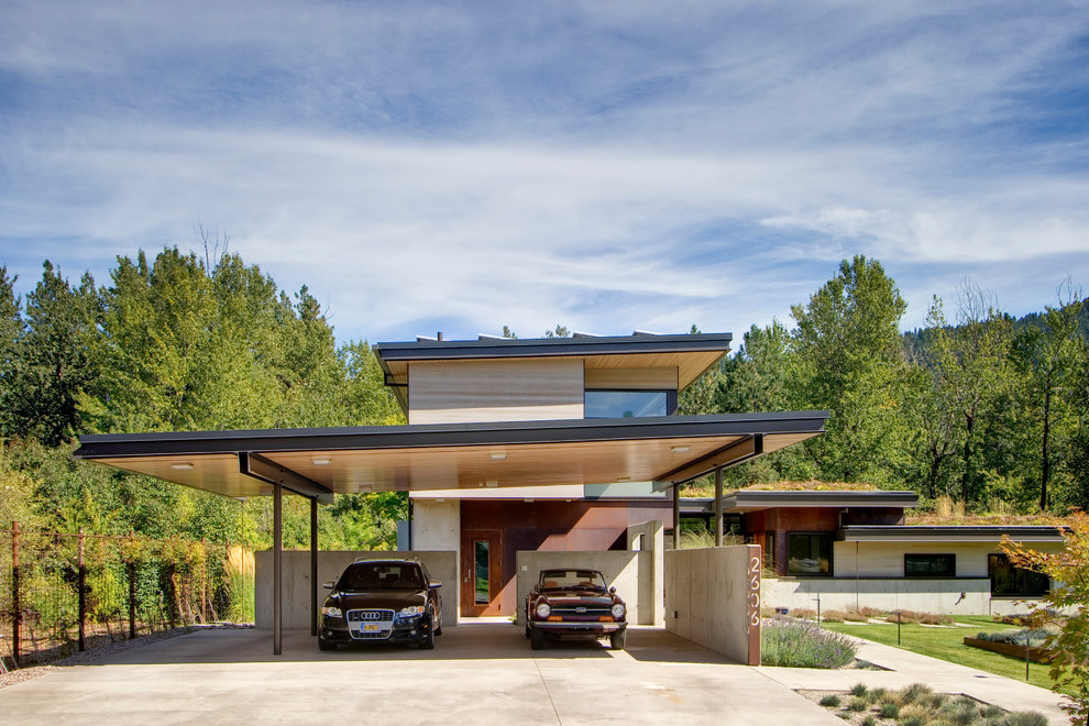 Источник вдохновения для домашнего уюта: гараж в современном стиле с навесом для автомобилей для двух машин