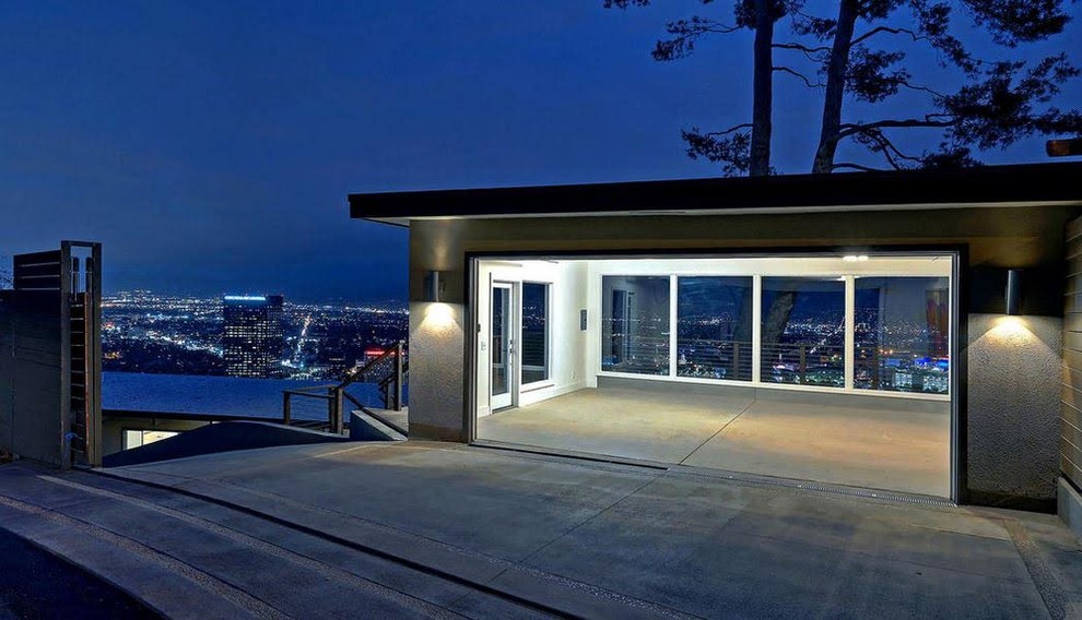 Large modern detached carport in Los Angeles with four or more cars.