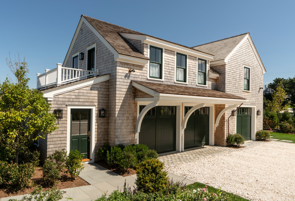Inspiration for a large coastal detached three-car garage remodel in Boston