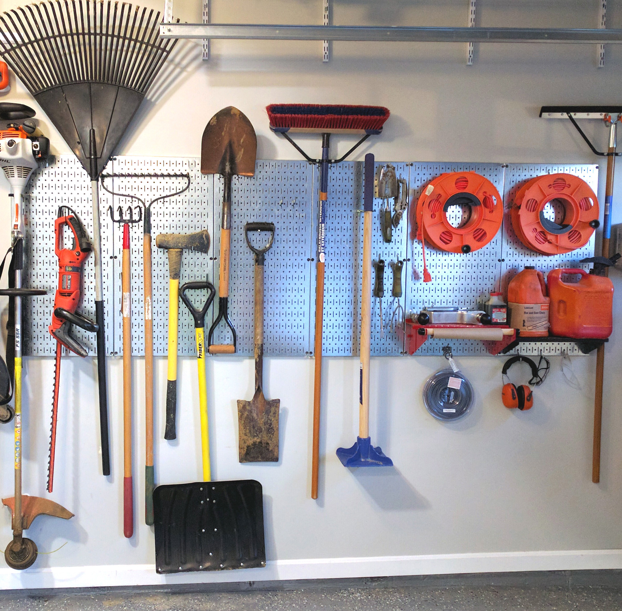 Neat and Tidy Pegboard Garage Garden Tool Storage by Wall Control - Garage  - Atlanta - by Wall Control | Houzz