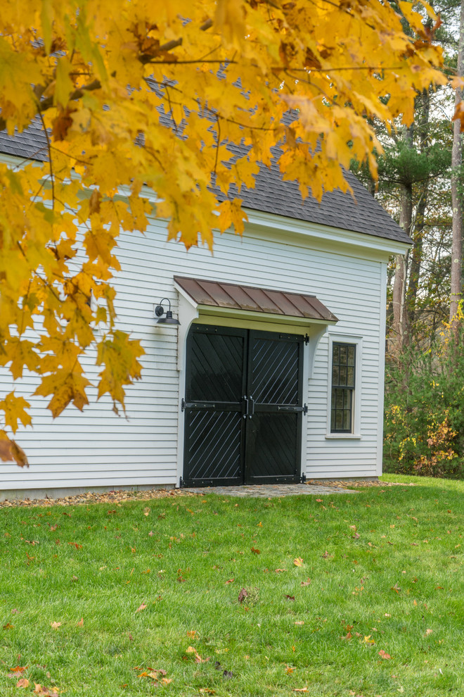Réalisation d'un grand garage séparé champêtre avec un bureau, studio ou atelier.