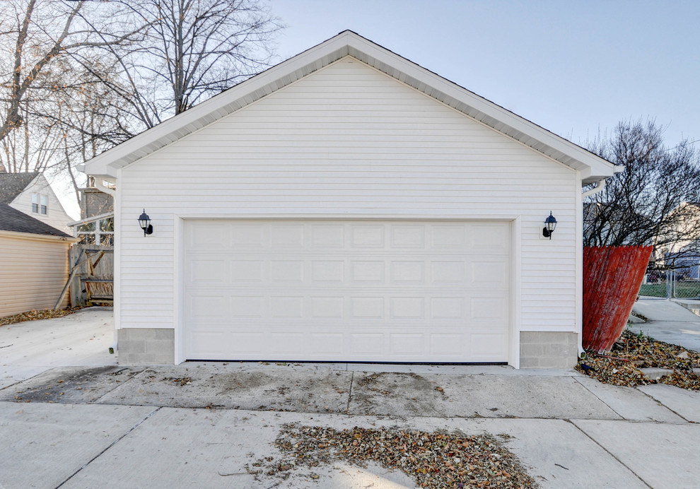 Inspiration for a medium sized classic detached double garage in Milwaukee.