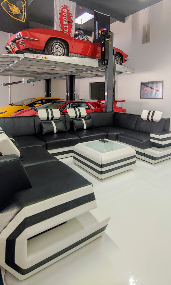 Foto de garaje adosado y estudio minimalista de tamaño medio para cuatro o más coches