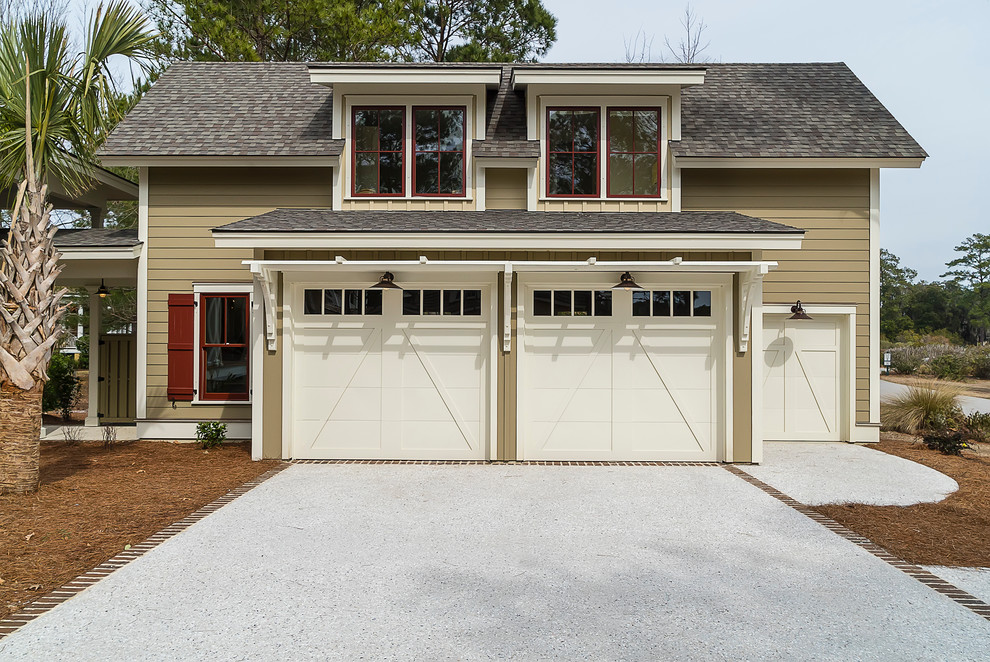 Example of a mid-sized classic detached three-car garage design in Charleston