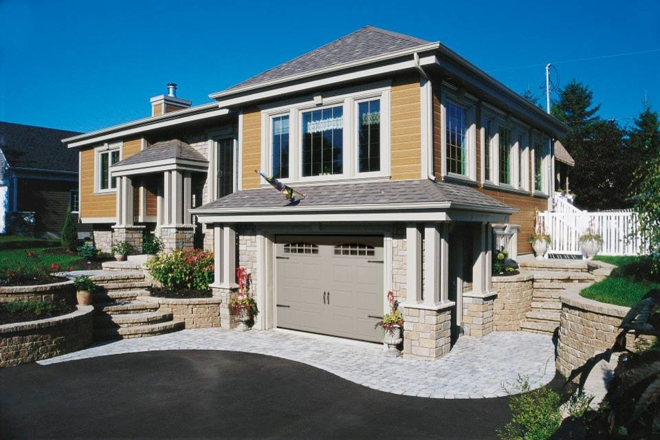 Inspiration for a medium sized attached double garage in Toronto.