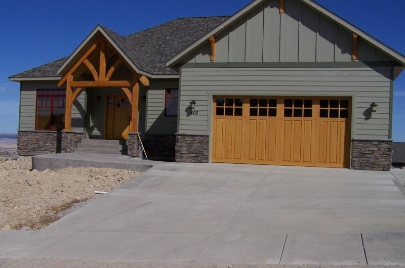 Inspiration for a mid-sized craftsman attached two-car garage remodel in Boise