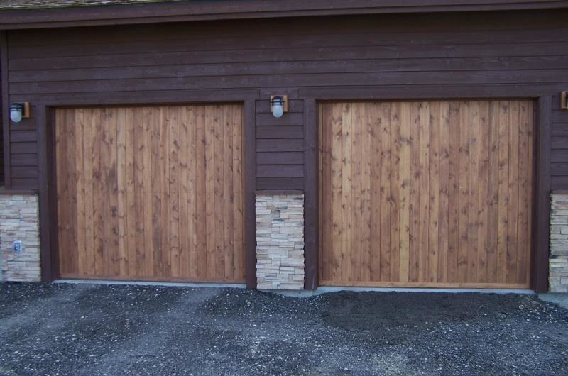 Inspiration for a medium sized rustic attached double garage in Boise.