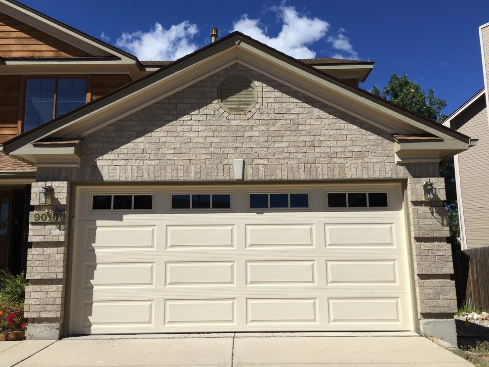 Design ideas for a medium sized classic attached double garage in Denver.