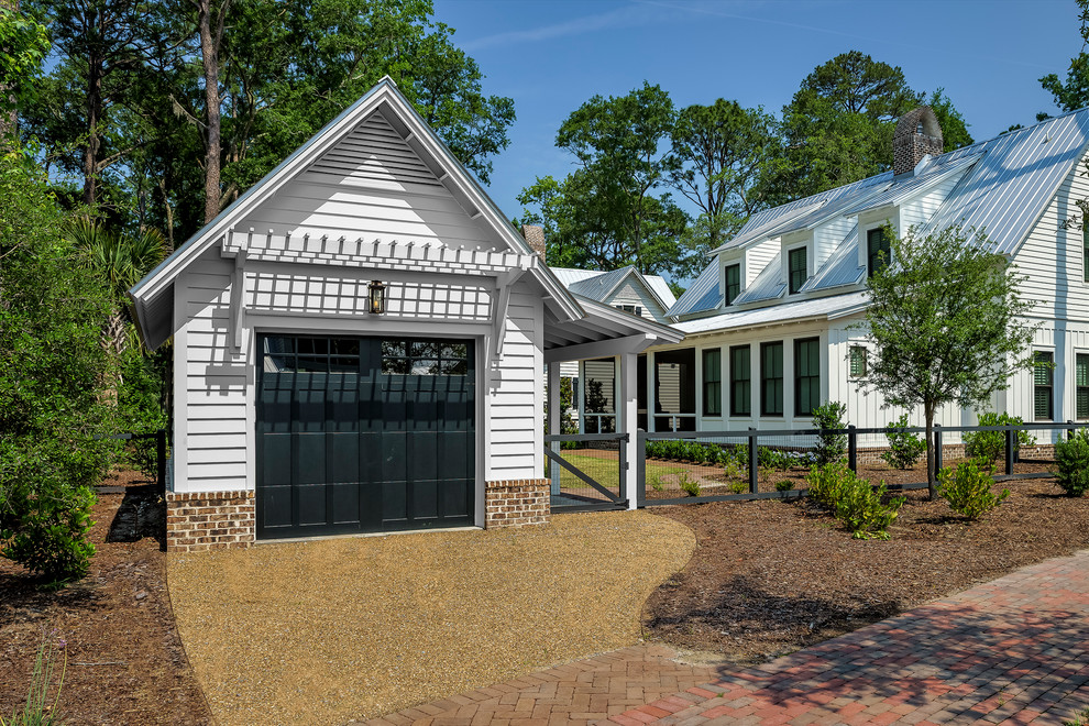 Example of a transitional garage design in Charleston