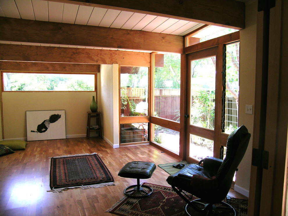Photo of a small contemporary attached garage workshop in San Francisco.
