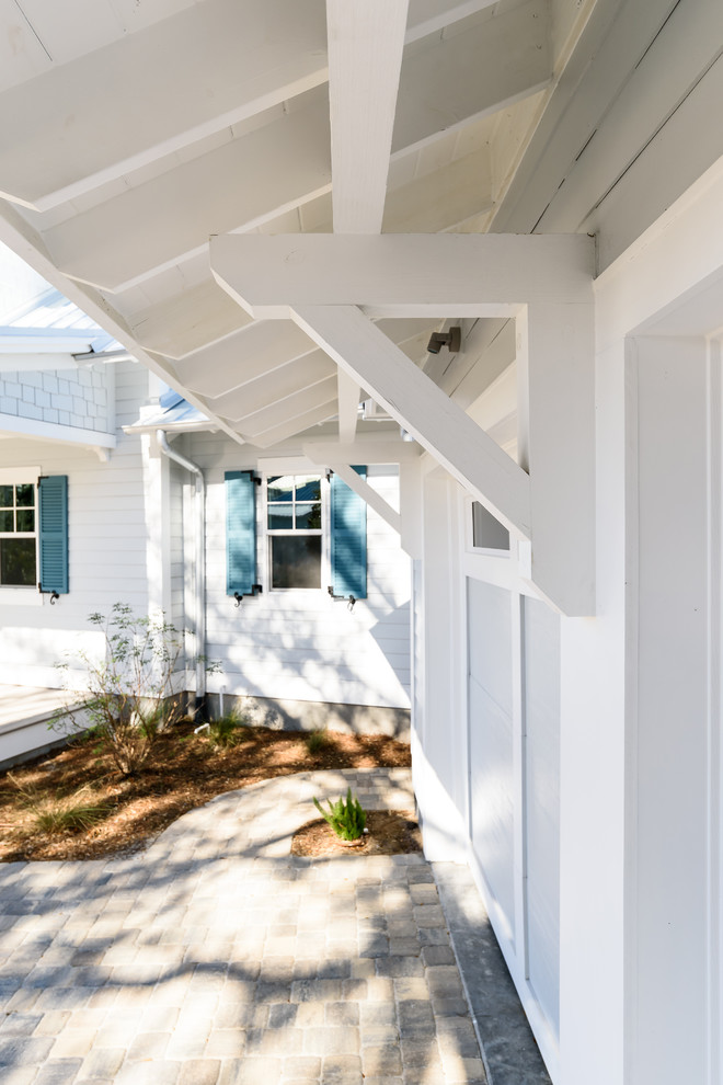 Example of a mid-sized beach style garage design in Jacksonville