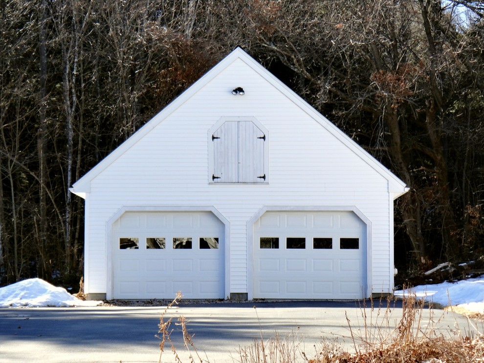 Example of a mid-sized classic detached two-car garage design in Boston