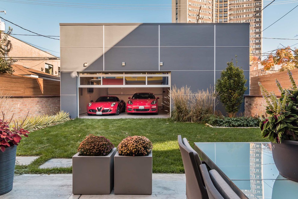 Example of a large minimalist detached two-car garage design in Chicago