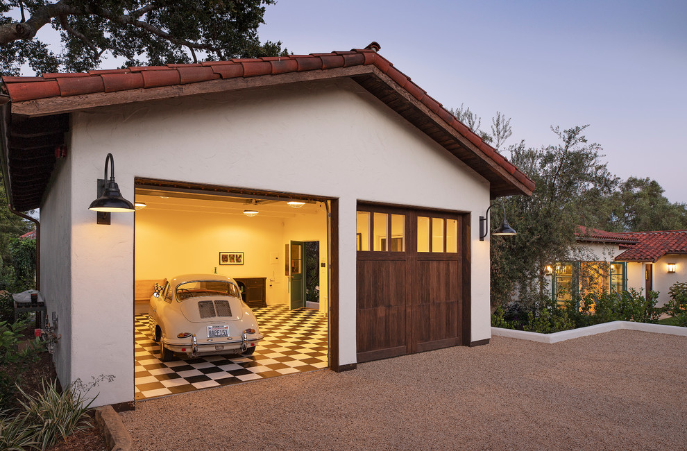 Example of a mid-sized tuscan detached two-car garage design in Santa Barbara