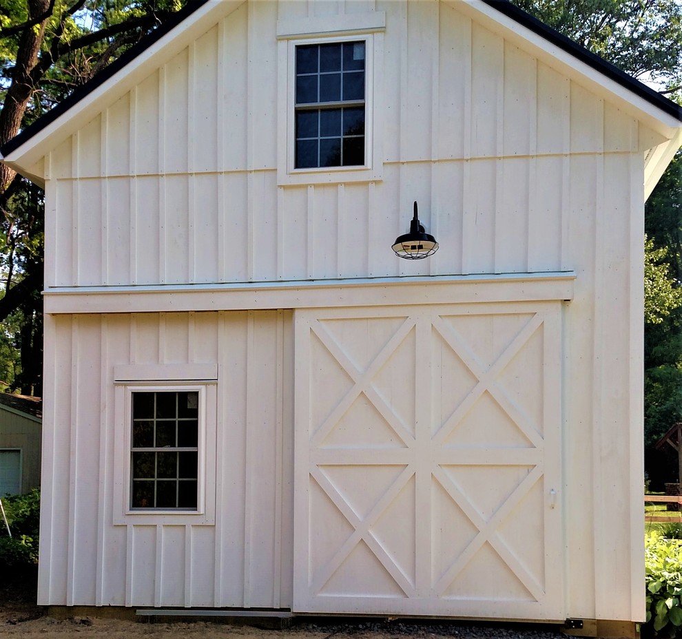 Idée de décoration pour un garage séparé champêtre de taille moyenne.