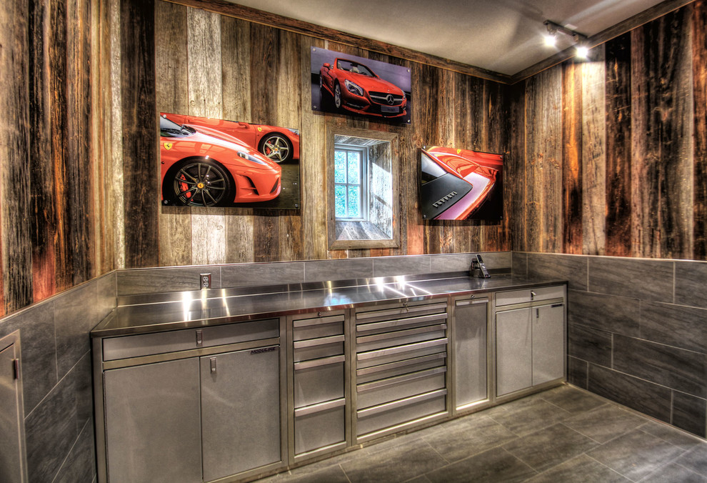 This is an example of a rustic garage workshop in Atlanta.