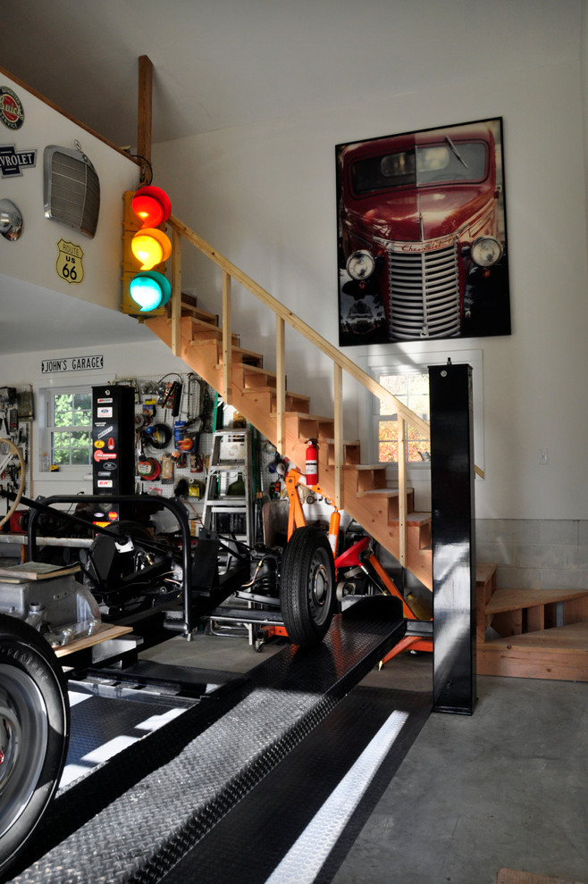 Garage workshop - large traditional detached three-car garage workshop idea in DC Metro