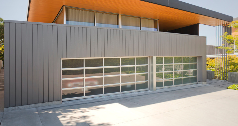 This is an example of a contemporary garage in Raleigh.