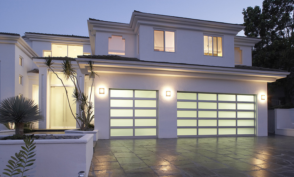 Large modern attached garage in Orange County with three or more cars.