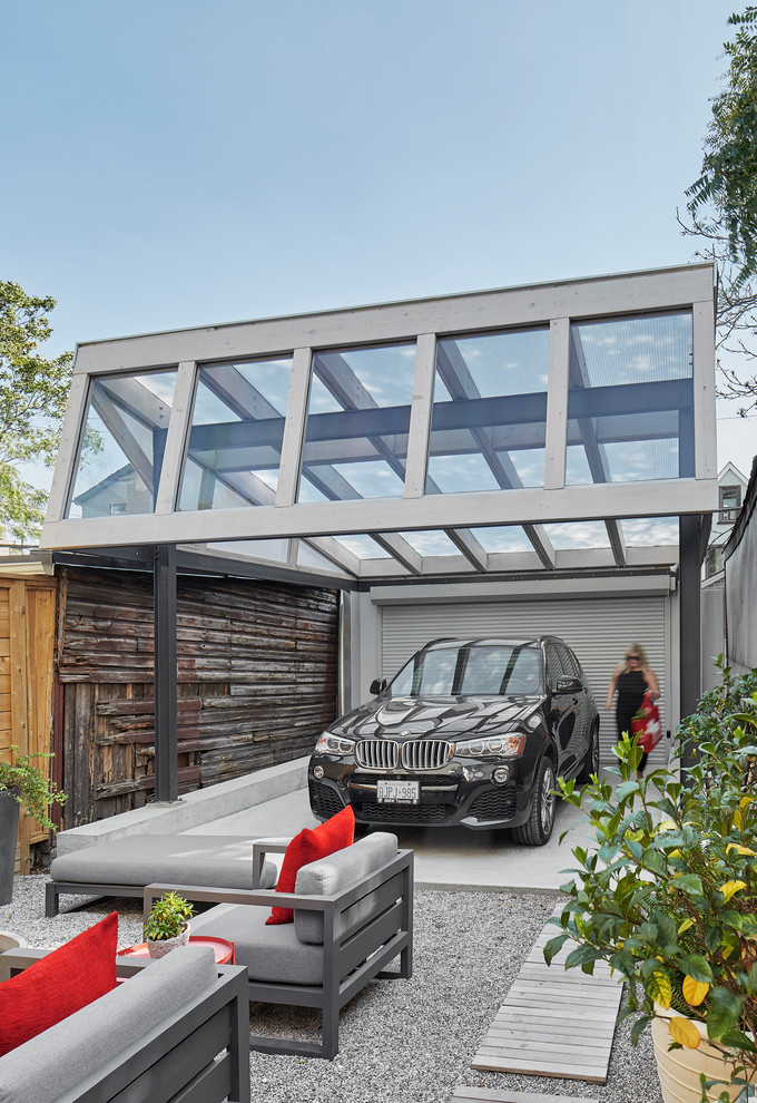 Источник вдохновения для домашнего уюта: гараж в скандинавском стиле с навесом для автомобилей для одной машины