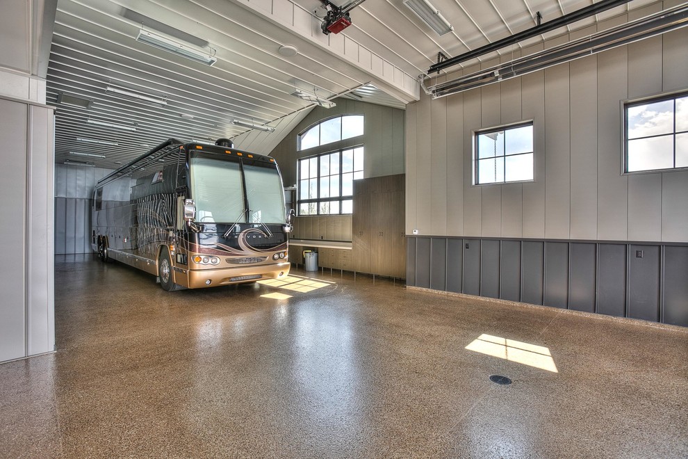 Design ideas for an expansive rustic attached garage in Denver with four or more cars.