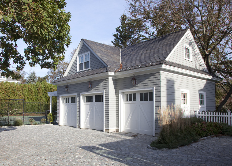 Inspiration for a timeless three-car garage remodel in Boston