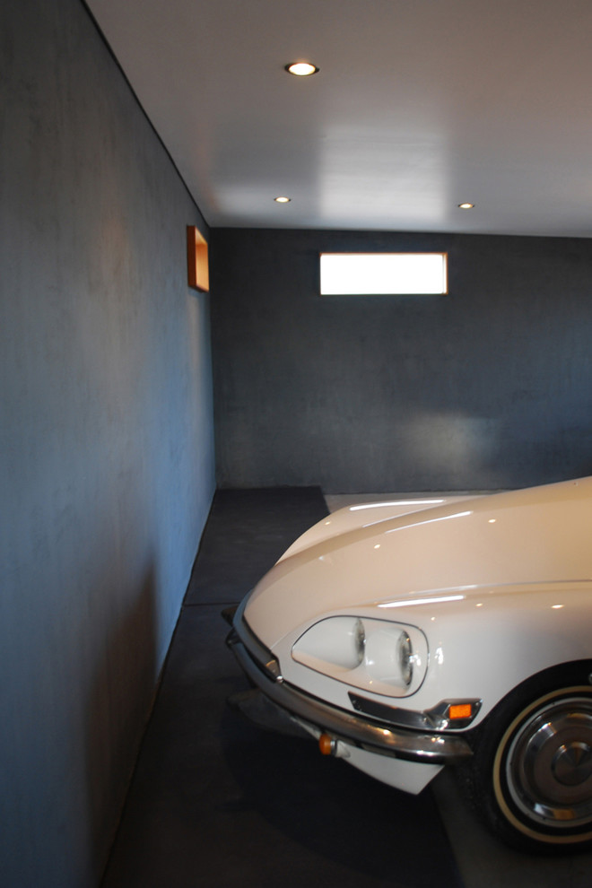 This is an example of a small modern attached double garage in Phoenix.