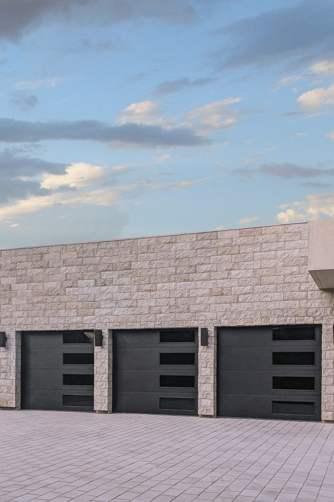 This is an example of a contemporary garage in Las Vegas.