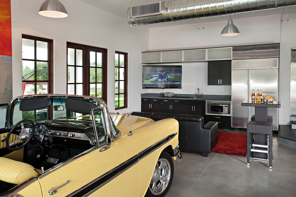 Example of a trendy one-car garage design in Phoenix