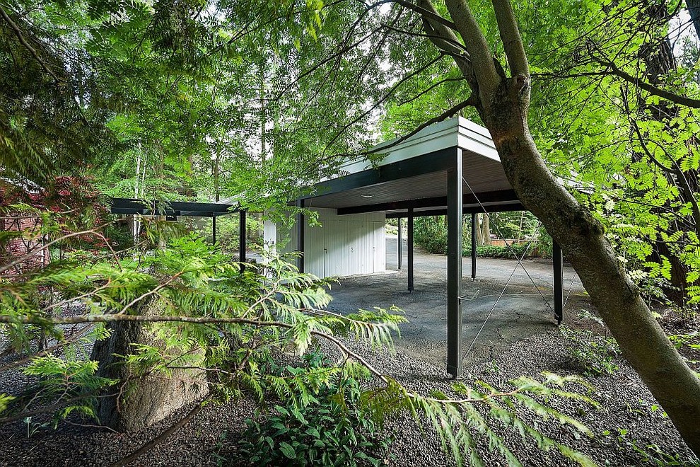 This is an example of a contemporary carport in Other.