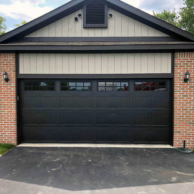 Stamped Carriage House Garage Door Black Traditional Garage by