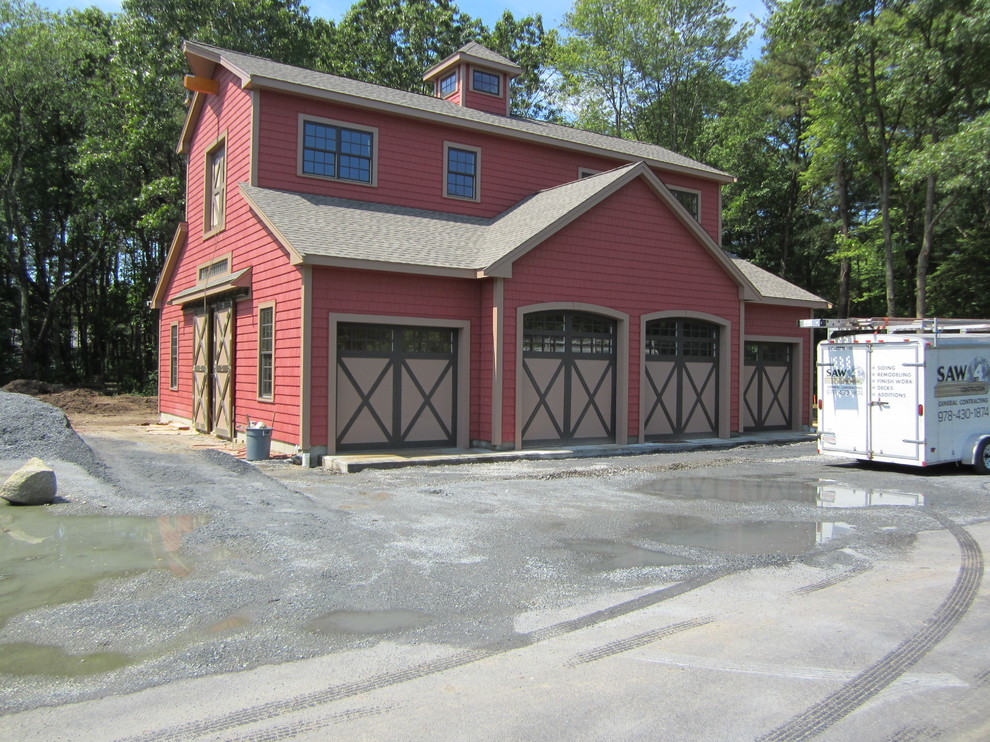 Inspiration for a modern detached garage in Boston with three or more cars.
