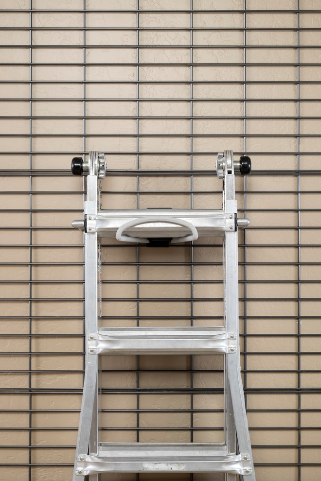 Step Ladder Storage on Custom Grid Wall Garage Other by Closets