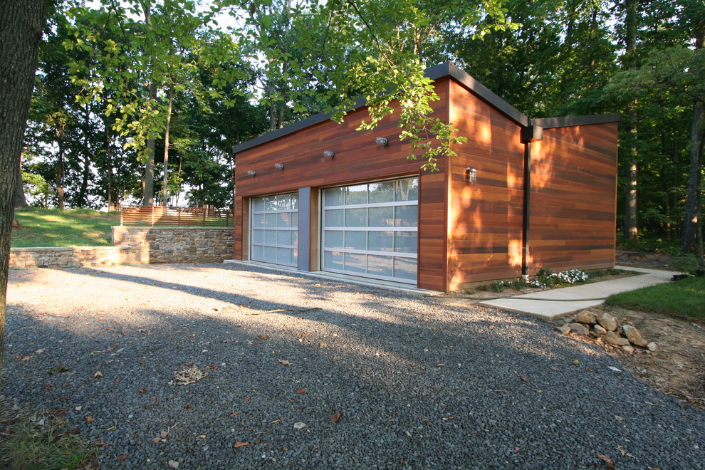 Réalisation d'un garage pour deux voitures séparé minimaliste.