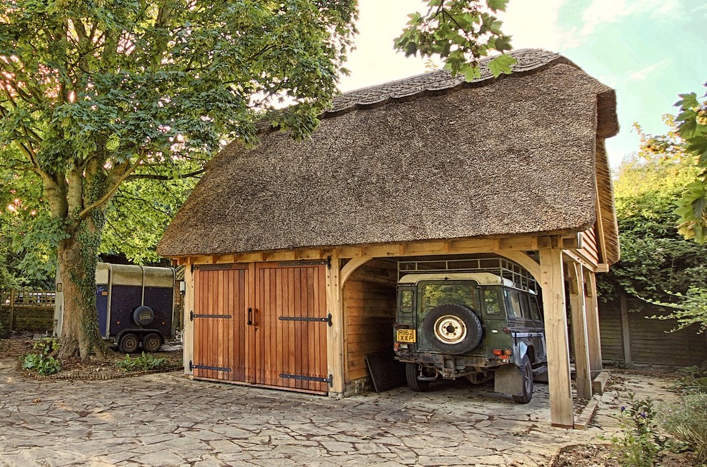Mid-sized country detached two-car carport photo in Gloucestershire