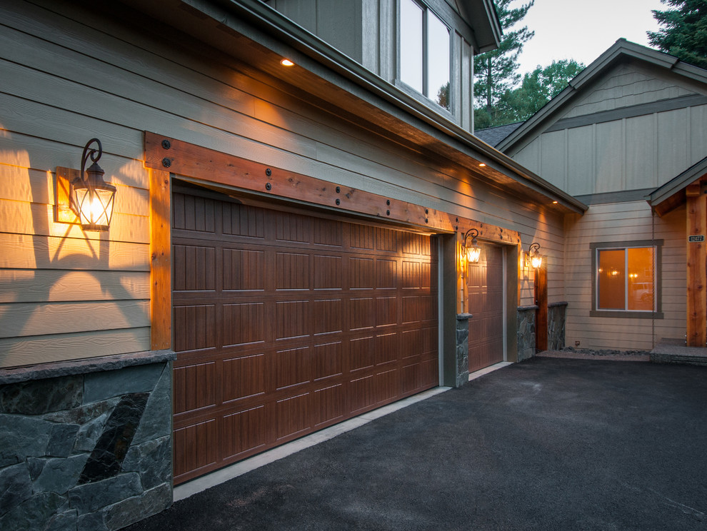 Photo of a medium sized traditional attached garage in Seattle with three or more cars.