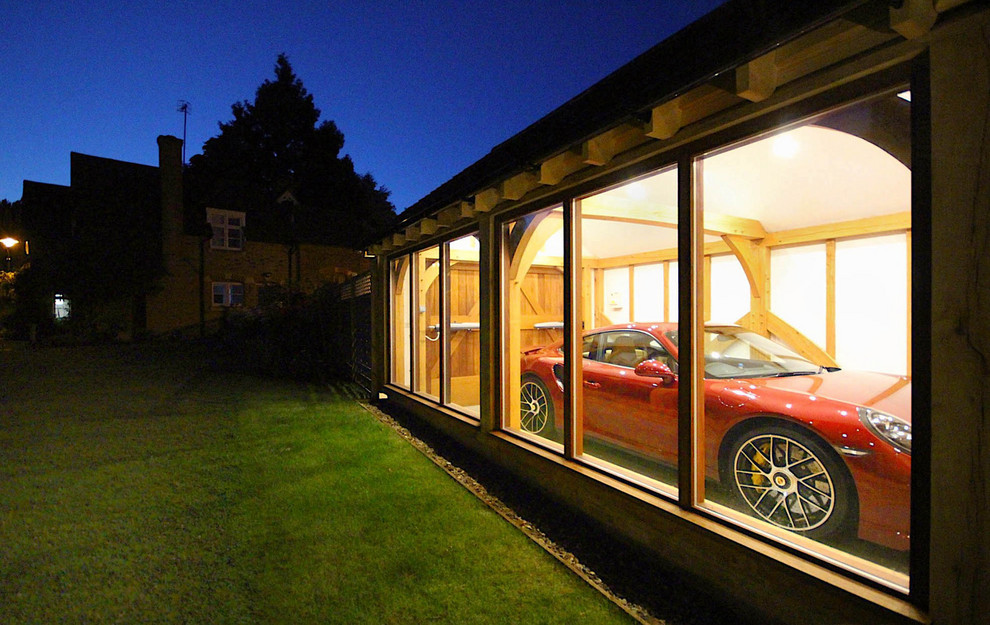 Inspiration för en mellanstor vintage fristående enbils garage och förråd
