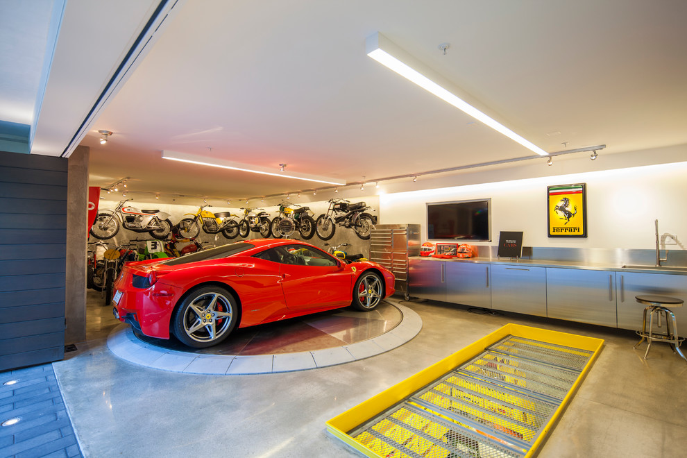 Inspiration for a mid-sized contemporary one-car garage workshop remodel in Orange County