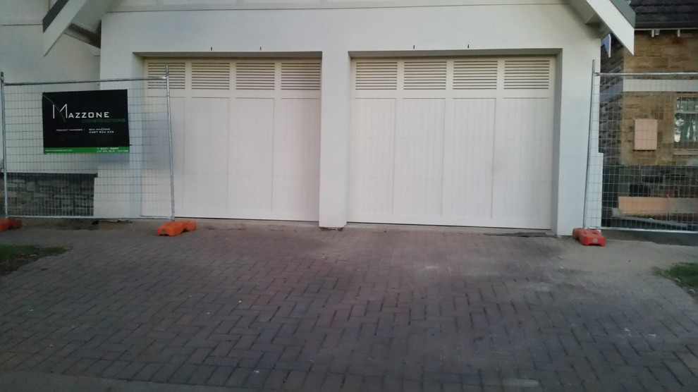 Tilt Garage door classic design with louvres Traditional Garage