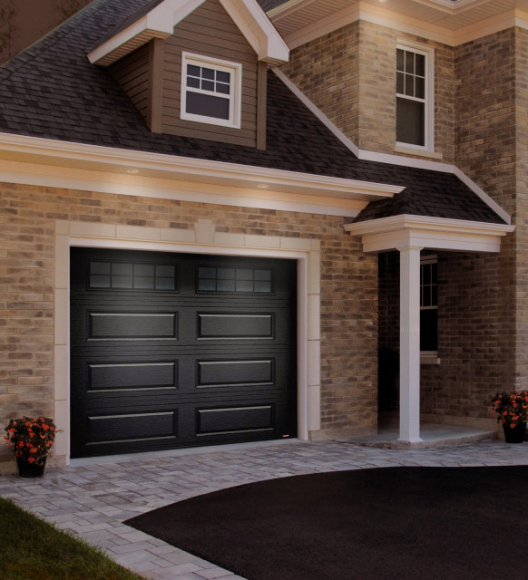 Traditional Residential Garage Door InstallationLong Panel Black Door