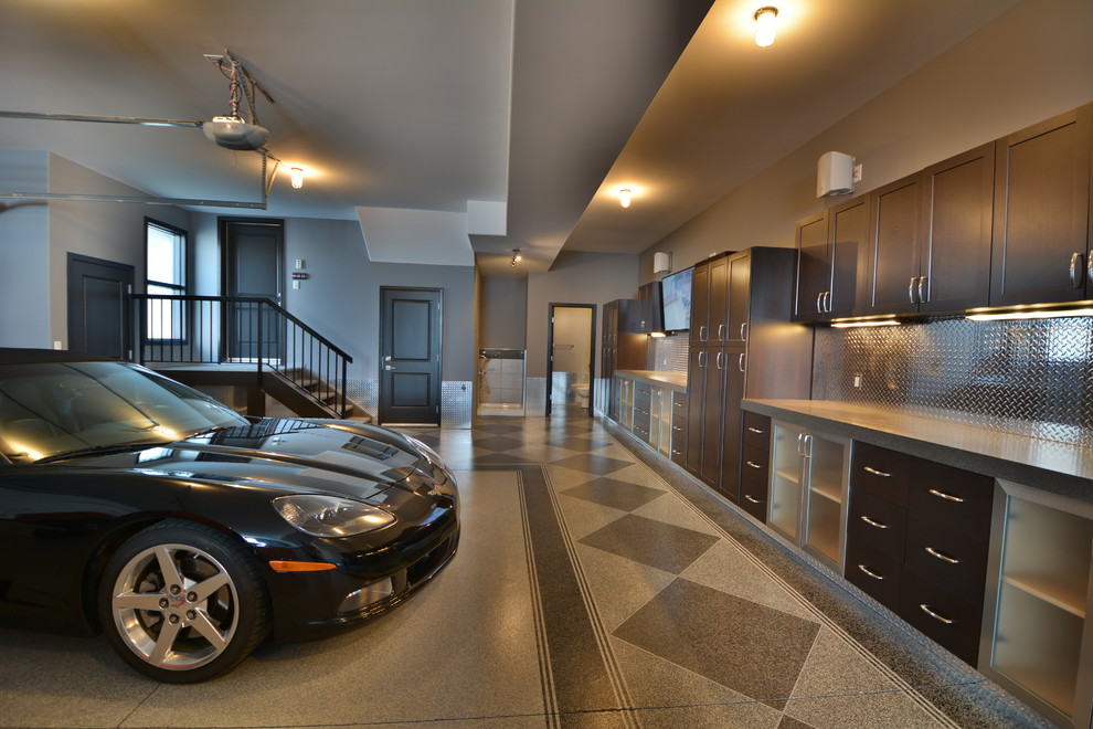 Example of a huge urban attached garage design in Edmonton
