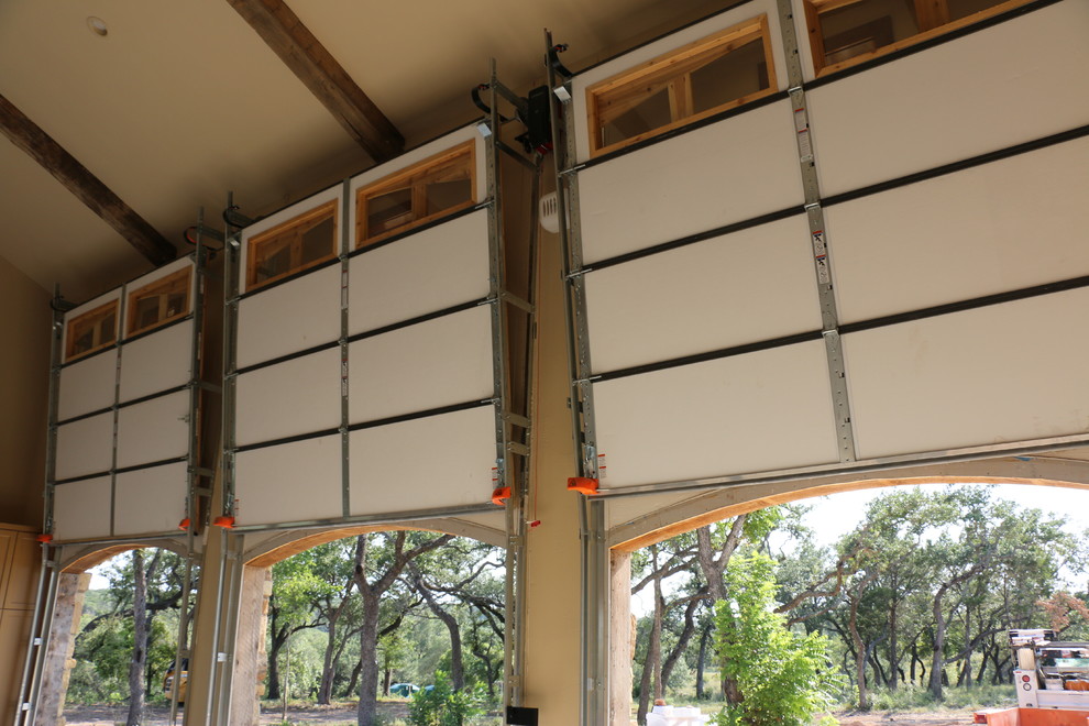 Vertical-lift real-wood overhead garage doors - Traditional - Garage