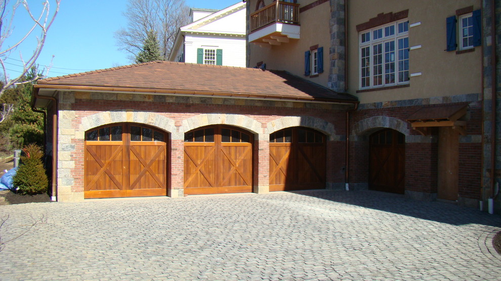 Inspiration for an expansive modern attached carport in New York with four or more cars.